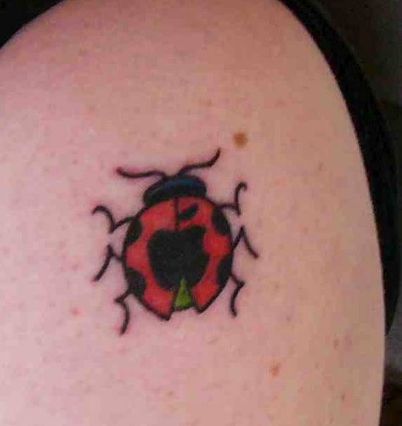 My Apple tattoo, cleverly hidden in the spots on a ladybug's back